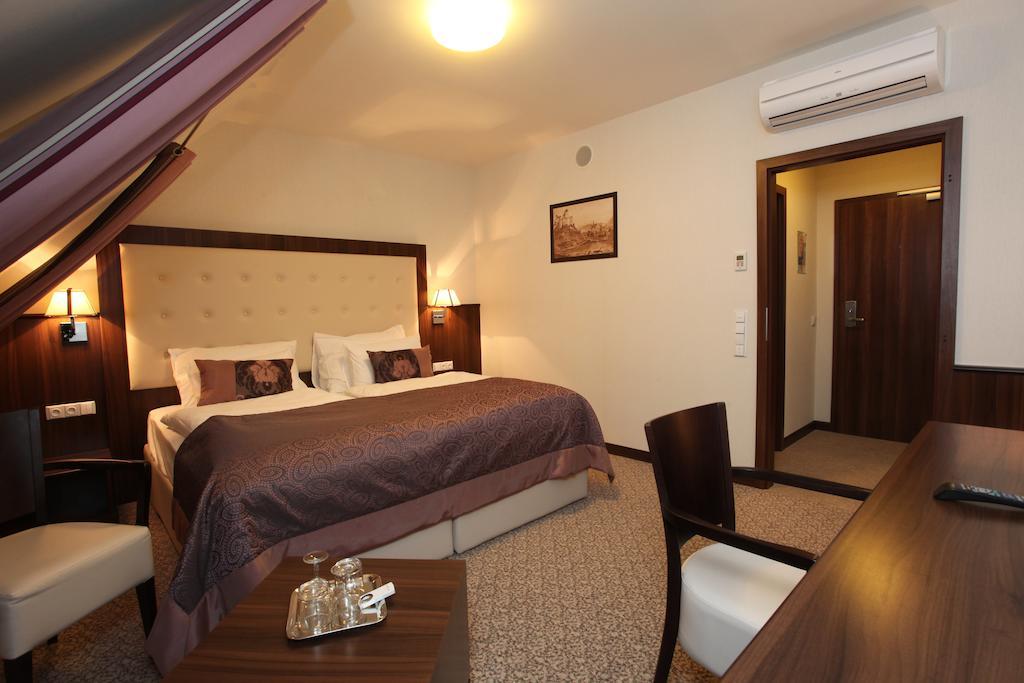 Hotel Sladovna Cerna Hora Rum bild